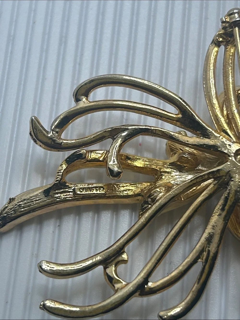 Gold and Silver Ribbon Bow Brooch with Crystals